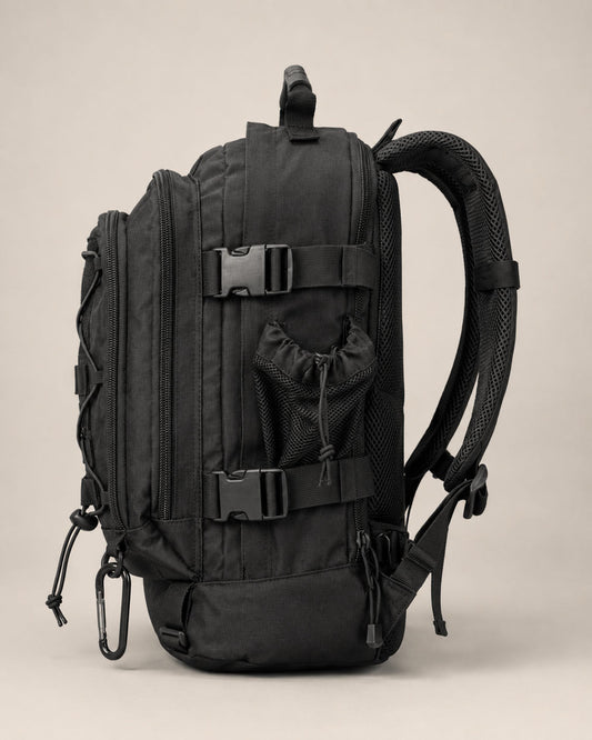 Black 60 L tactical backpack side view with mesh bottle pocket and compression straps