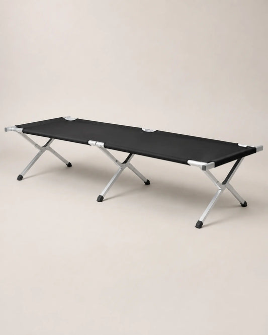 Army Black portable camping cot from the left three-quarter angle
