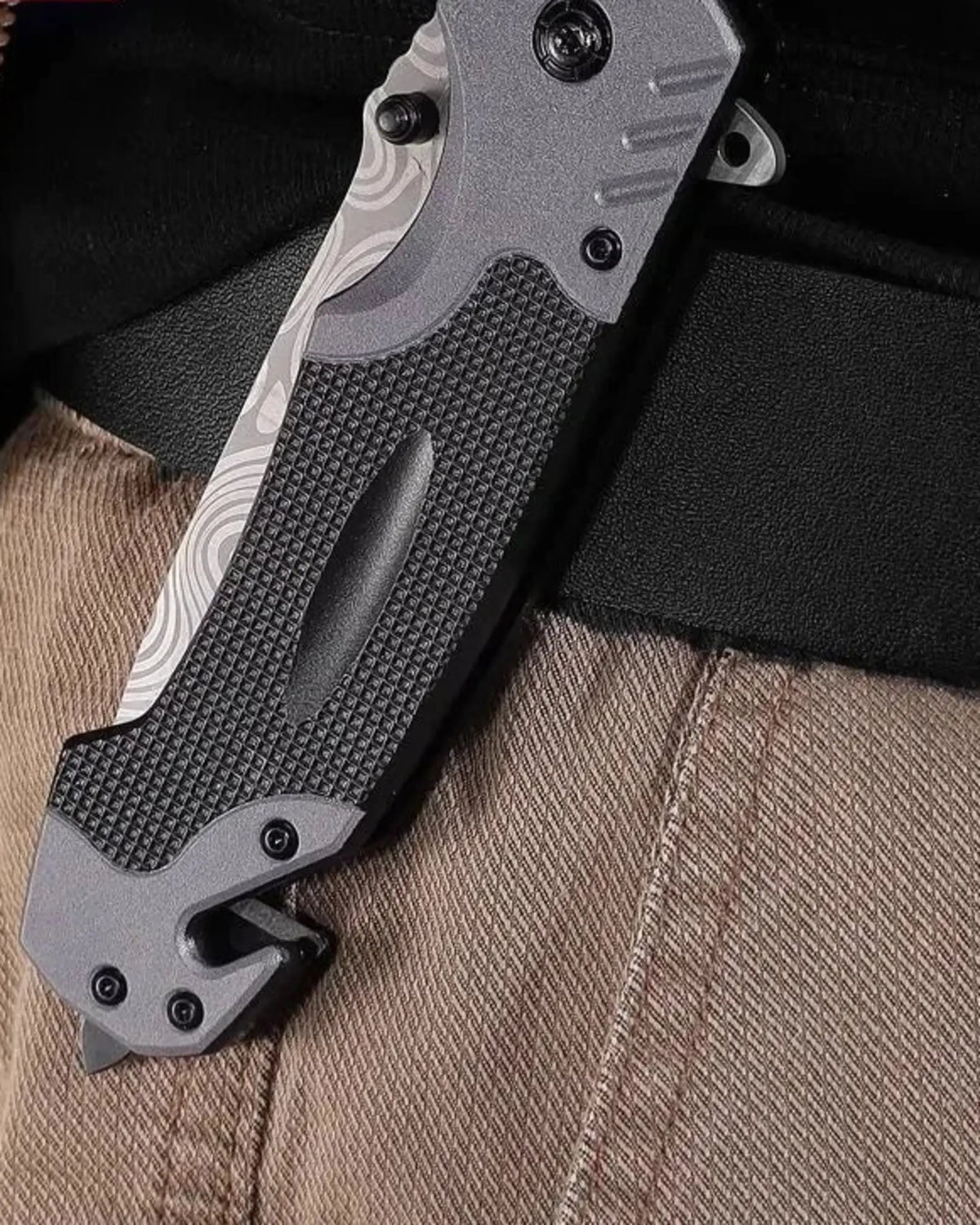 Closed KK6 folding knife carried at the waist for travel context