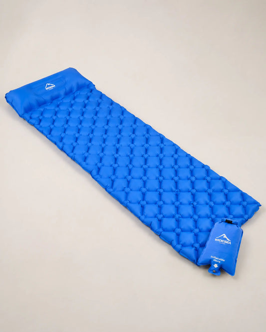 Blue WIDESEA sleeping mat and inflation sack from left three-quarter angle
