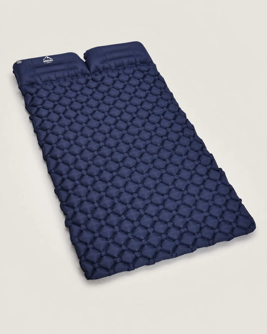 Navy double inflatable camping mat from the left angle with twin integrated pillows