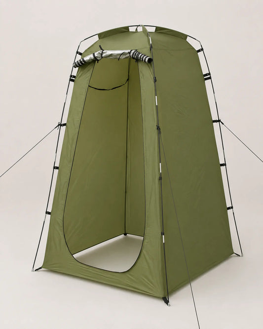 Open green privacy tent from left three-quarter studio angle