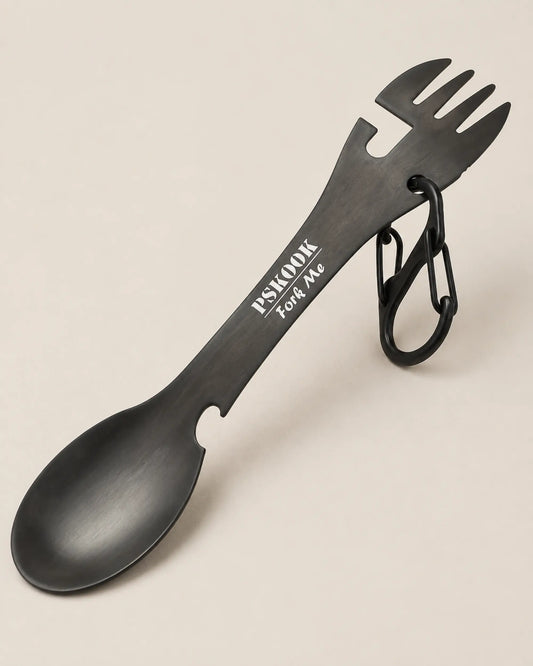 Black PSKOOK camping spork shown from a three-quarter left angle