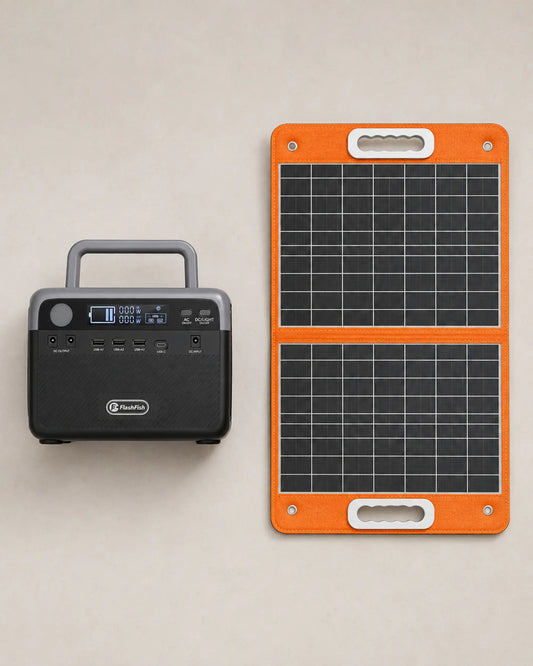 Overhead flat lay of FlashFish power station and folded solar panel kit