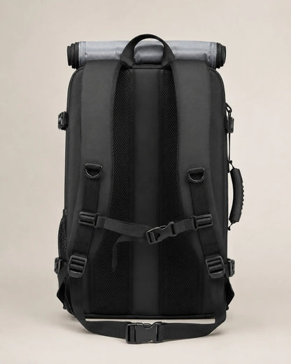 Padded back panel and adjustable shoulder straps on a black travel backpack