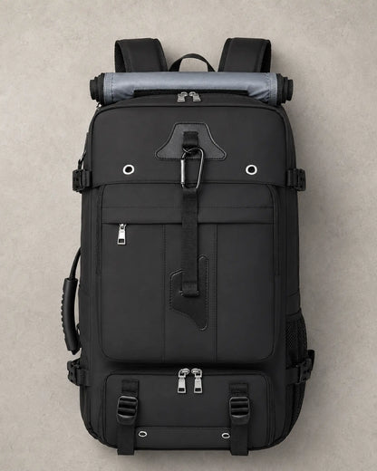 Top-down view of a black expandable travel backpack