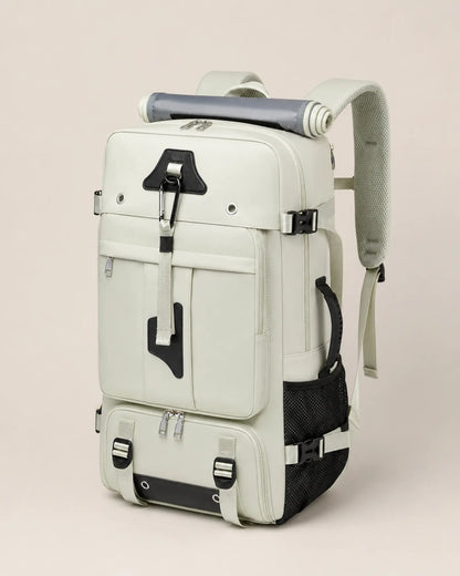 Green travel backpack, right three-quarter view with mesh water bottle pocket