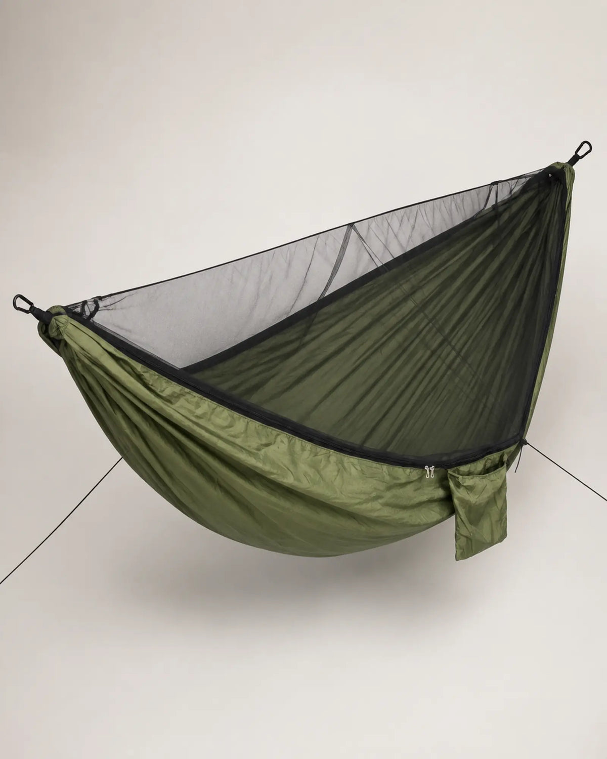 Elevated view of the ArmyGreen hammock canopy and zipper construction