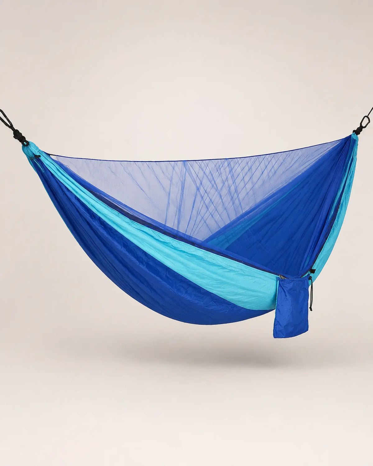 Blue and turquoise mosquito-net hammock shown from the left three-quarter angle