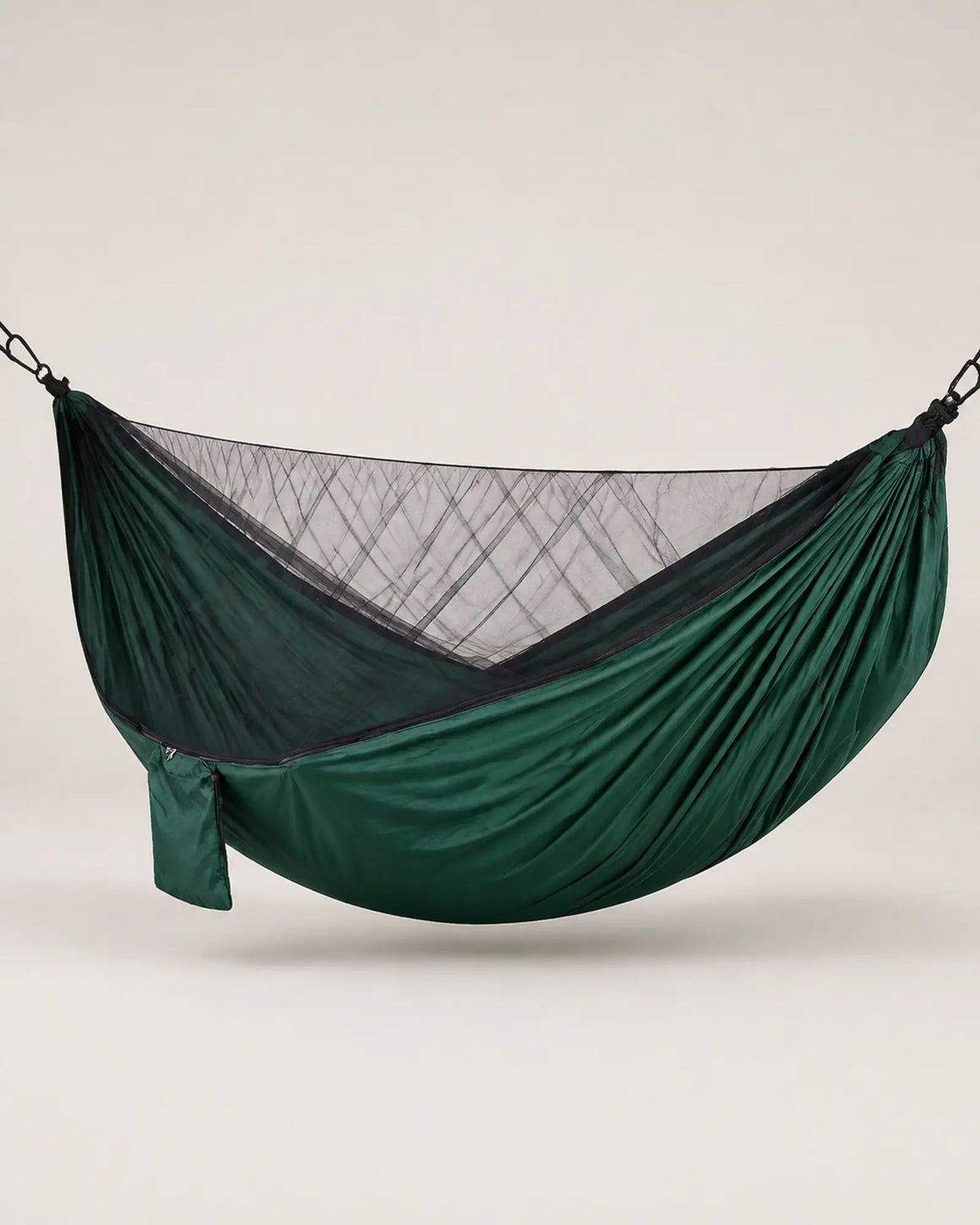 Dark green camping hammock with black mesh from the right angle