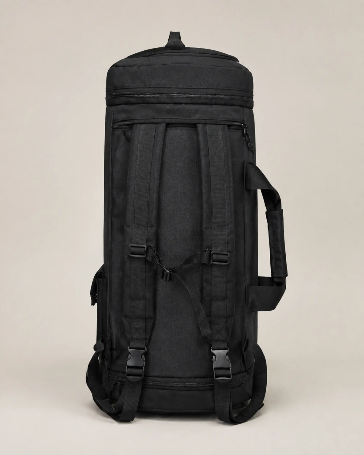 Back view of the black travel bag with dual backpack shoulder straps