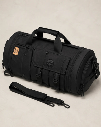 Elevated view of the black multi-carry travel bag and shoulder strap