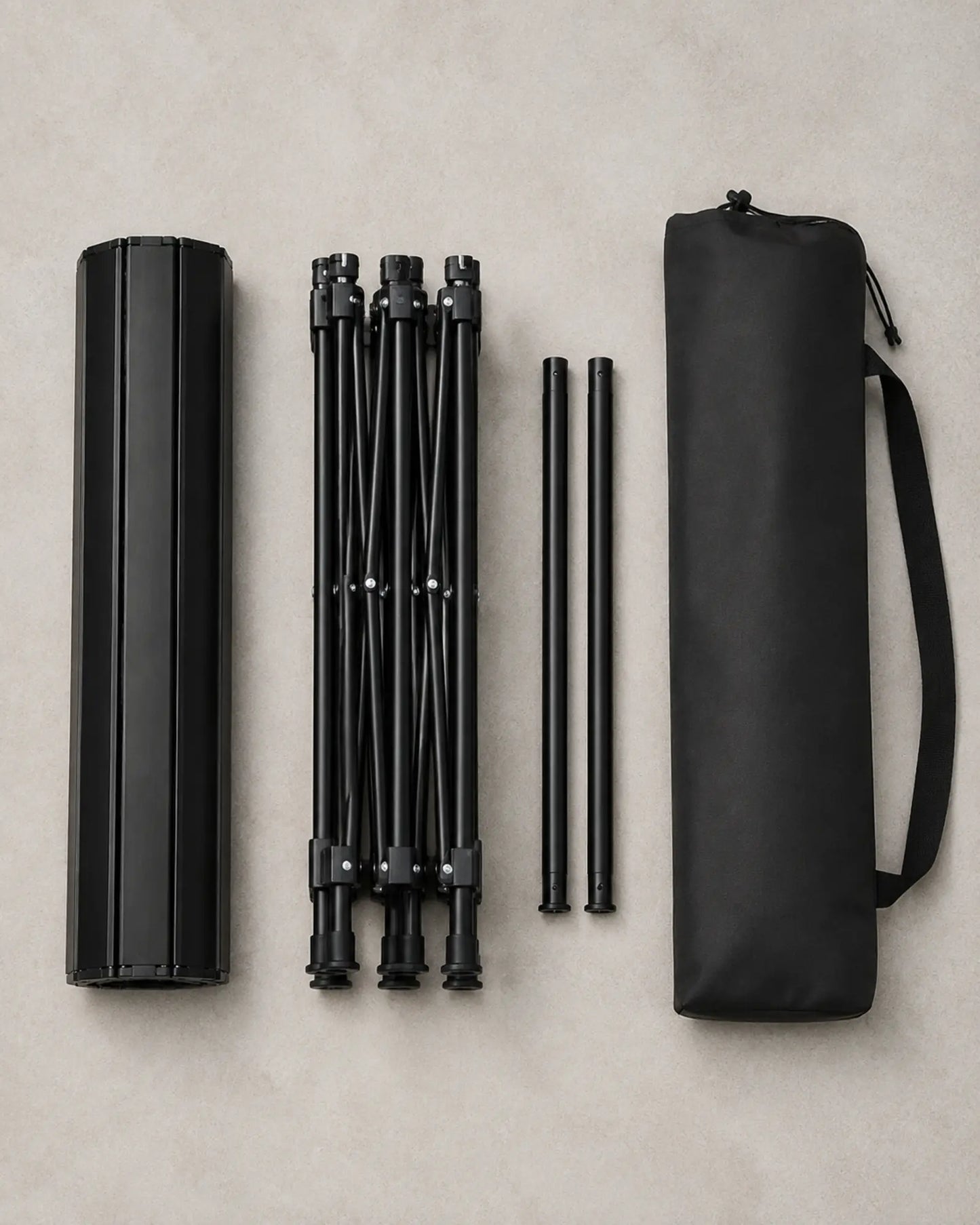 Rolled tabletop folded frame support rails and black carry bag
