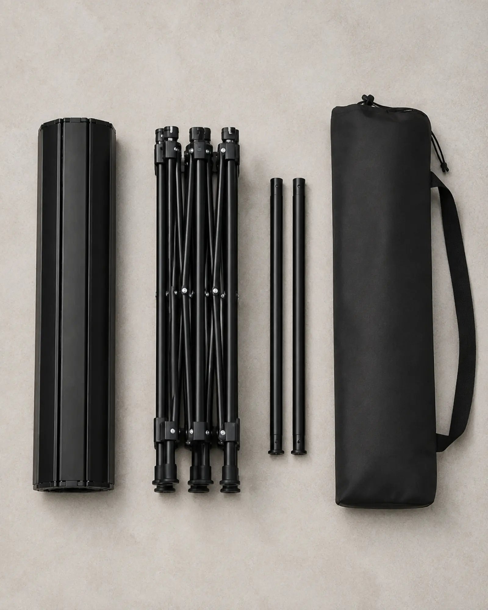 Rolled tabletop folded frame support rails and black carry bag