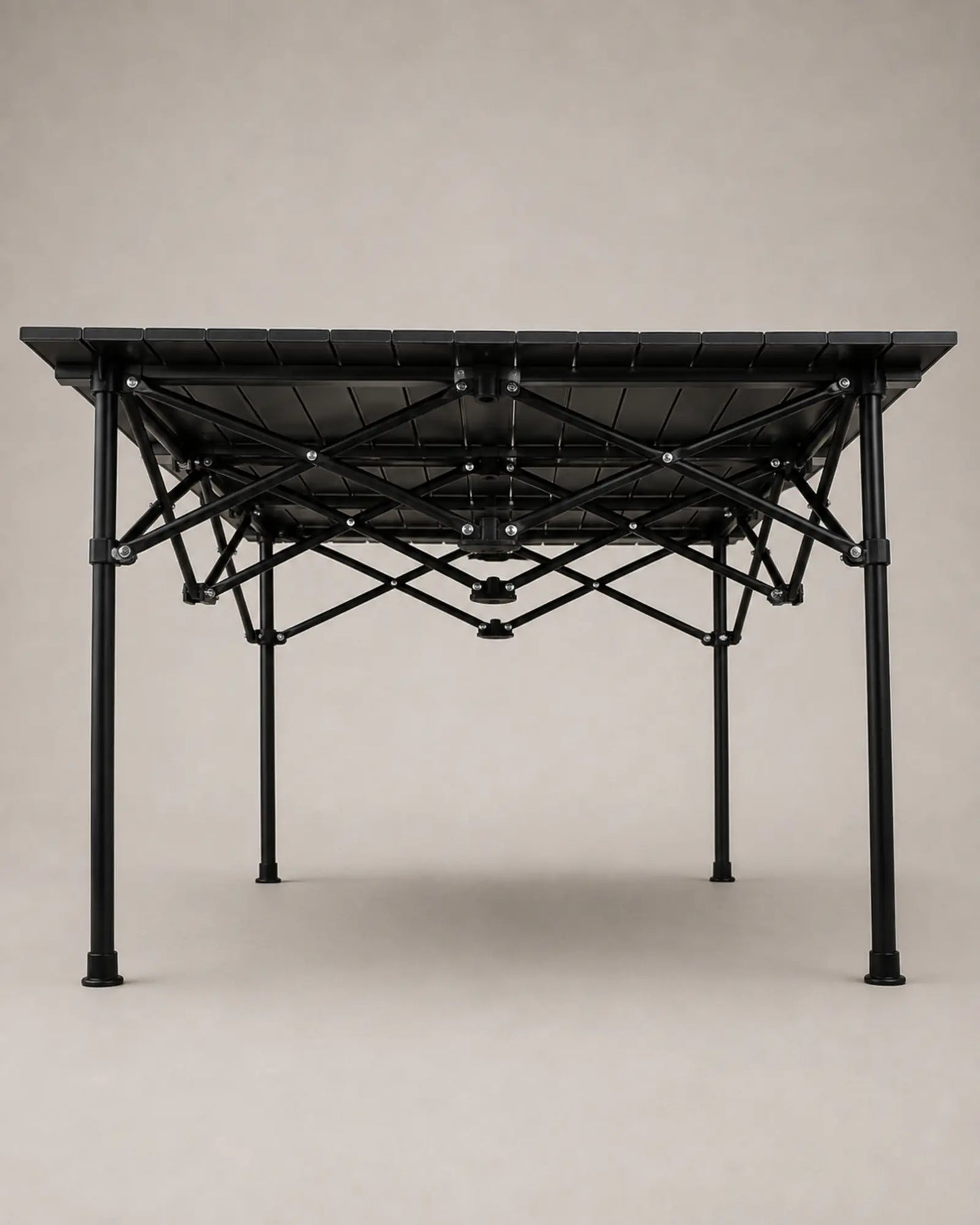 Underside construction of the roll-up camping table and scissor braces
