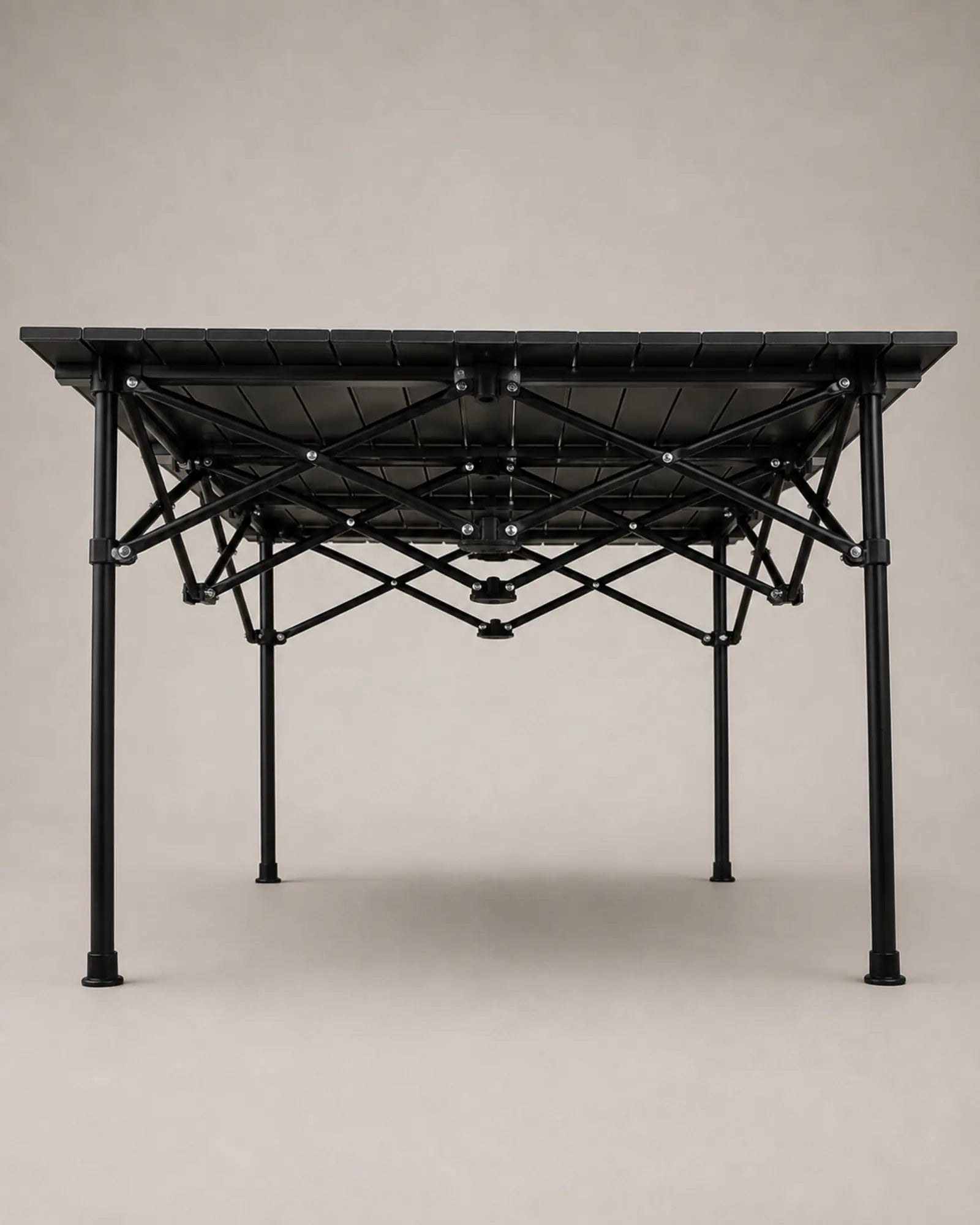 Underside construction of the roll-up camping table and scissor braces