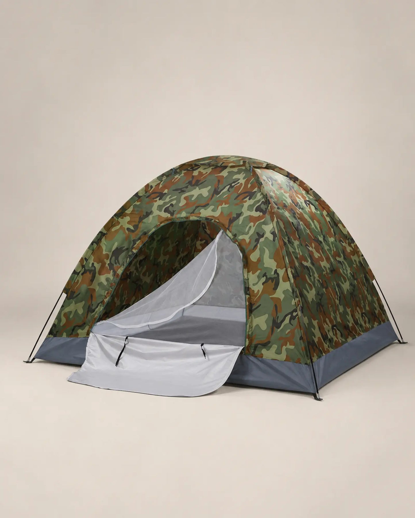 Woodland camouflage dome tent shown from the left front angle