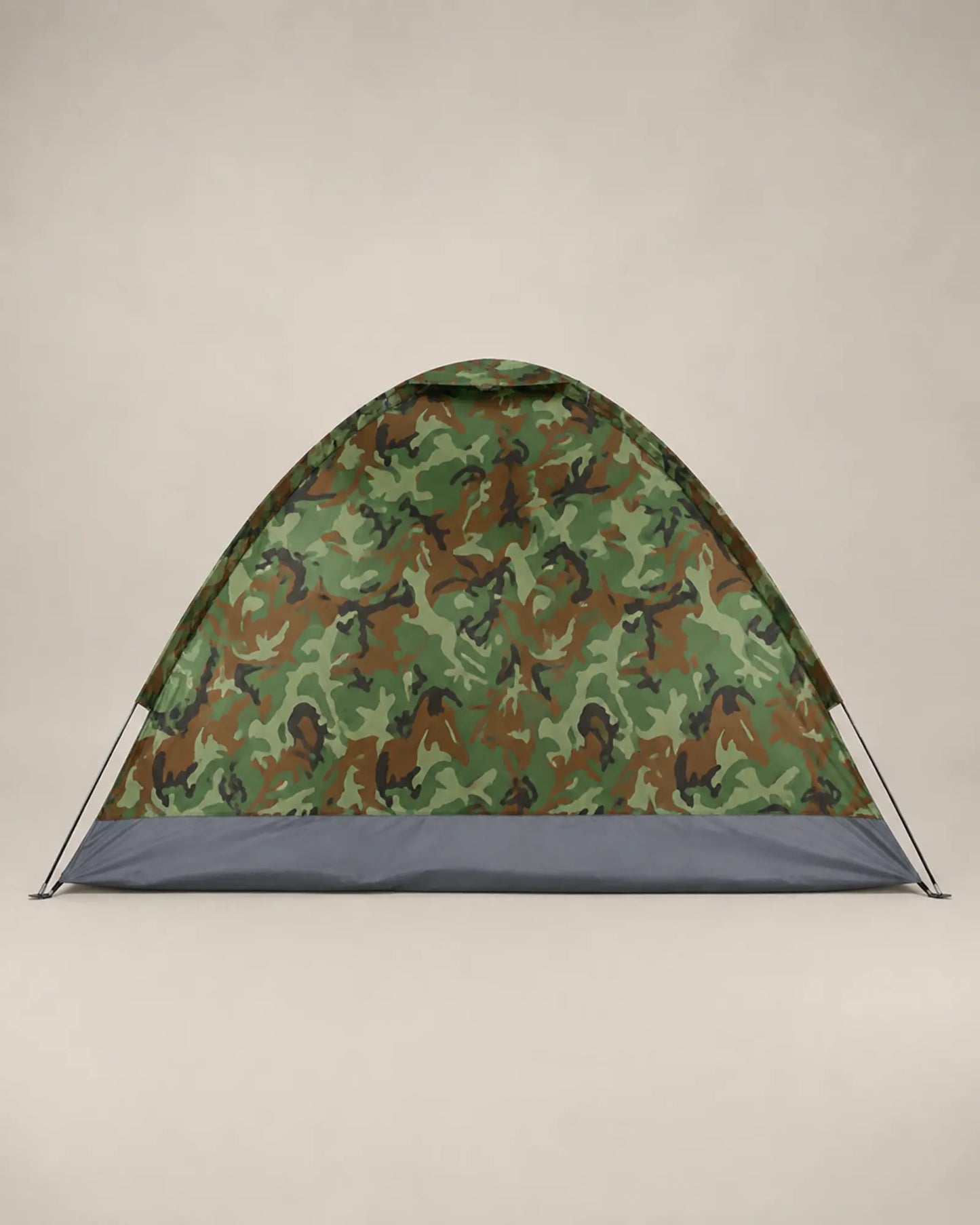 Side profile of the low camouflage dome tent and grey floor skirt