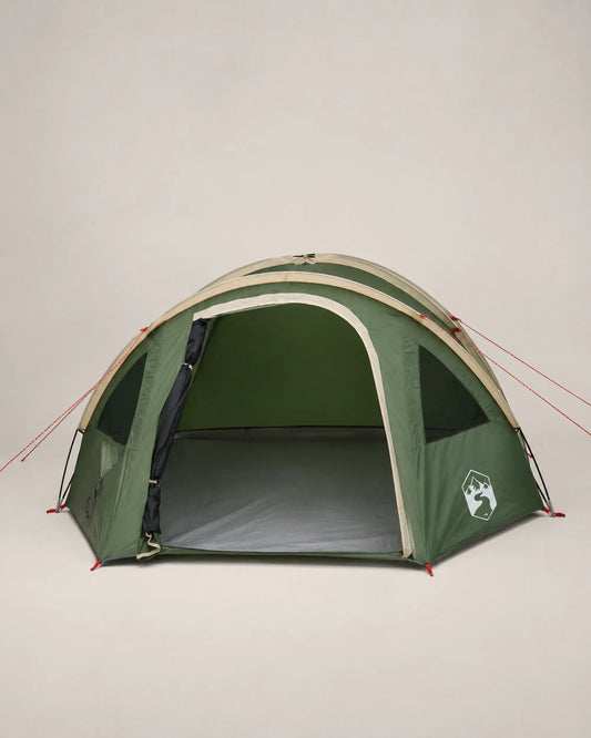 Green family dome camping tent with extended roof in front studio view
