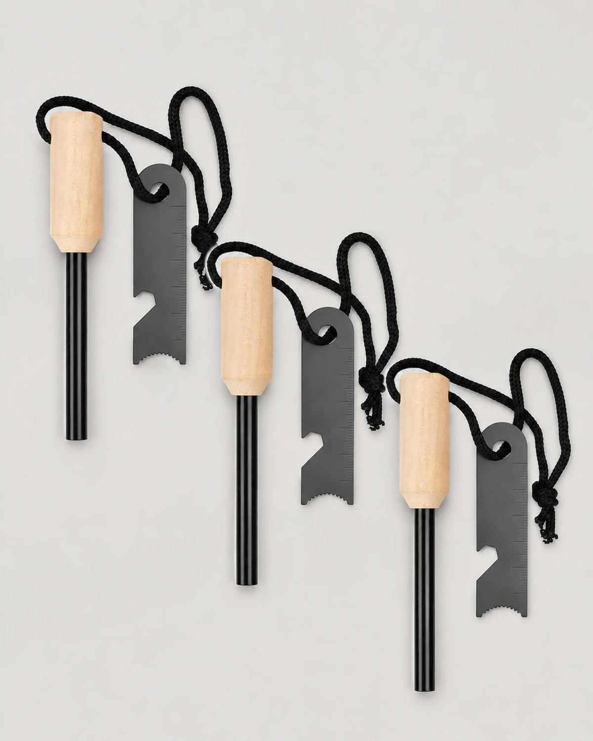 Three ARWE cylindrical wood-handle ferrocerium fire starter kits with steel strikers