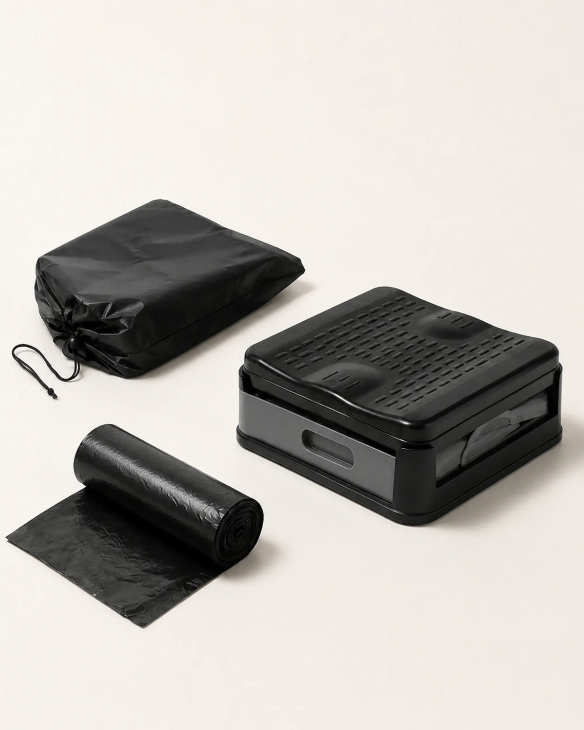 Foldable portable camping toilet kit with compact toilet, black carry bag and roll of liner bags