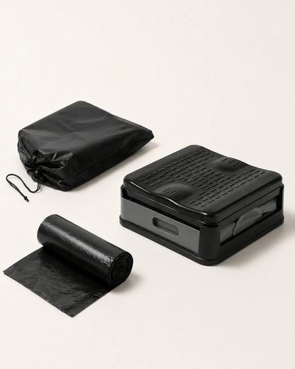Foldable portable camping toilet kit with compact toilet, black carry bag and roll of liner bags