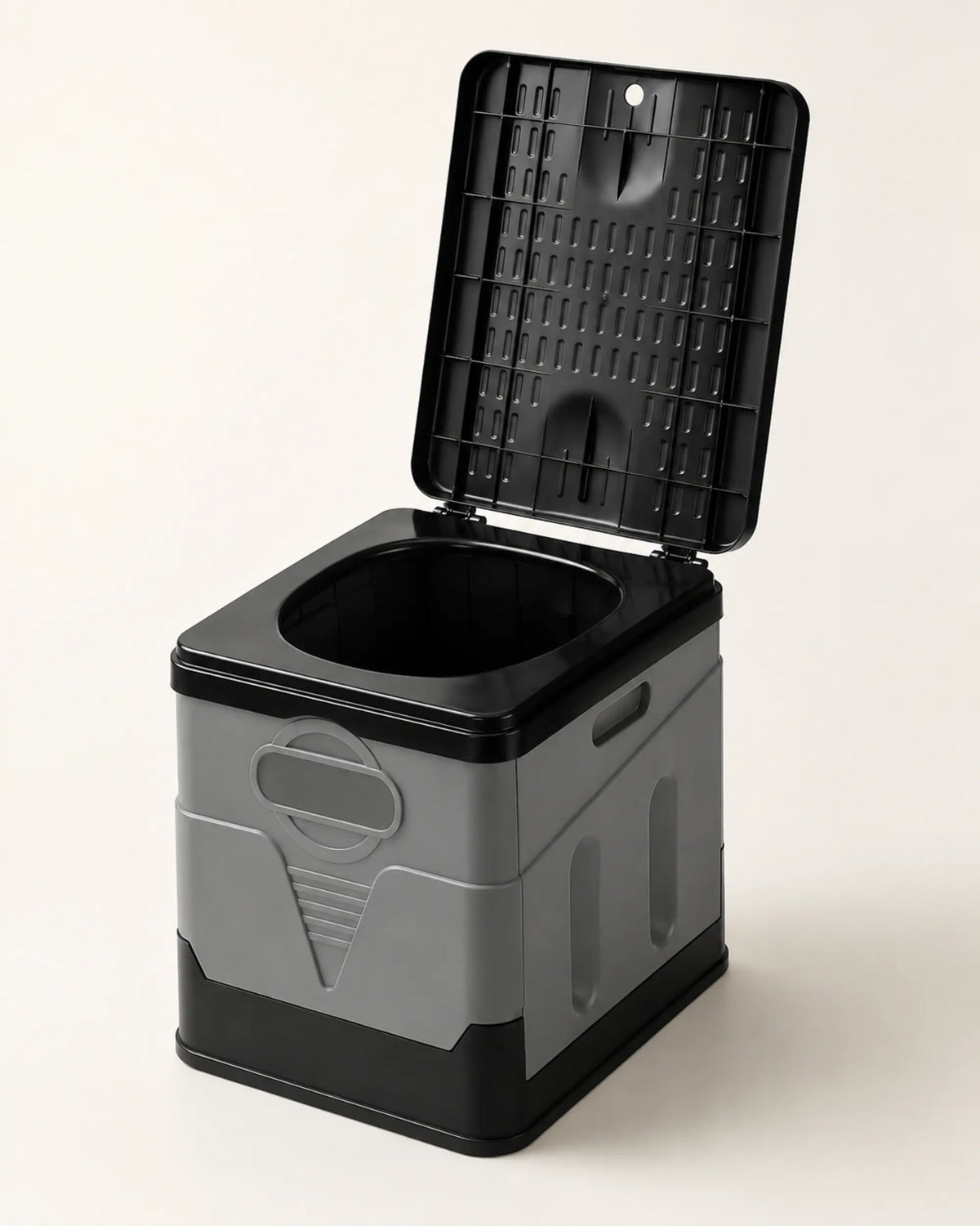 Grey foldable portable camping toilet fully assembled with the black lid raised in a front three-quarter hero view