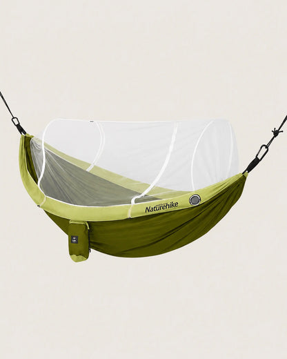 Green double camping hammock with white tunnel mosquito net deployed