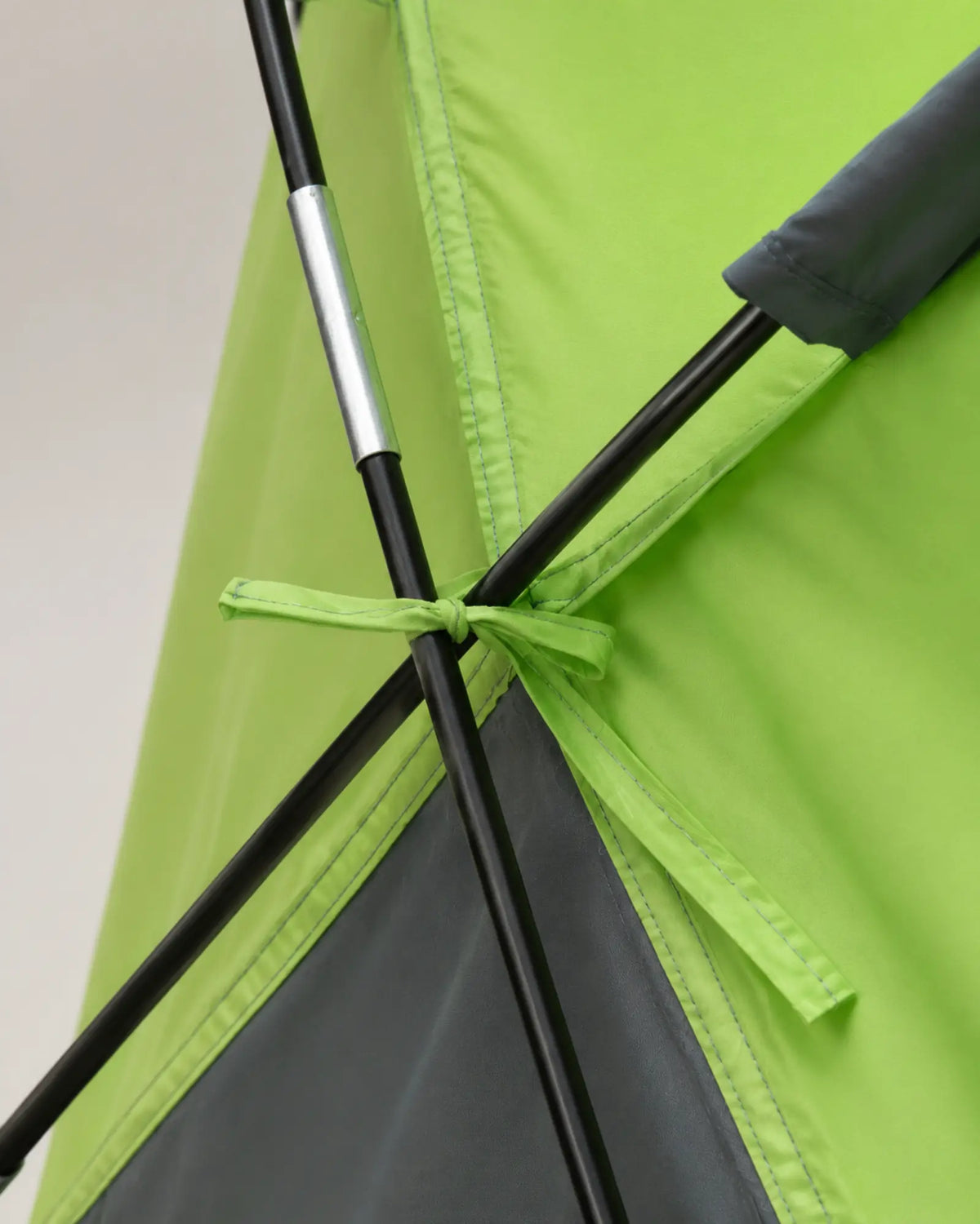 Close-up of the fiberglass pole joint and green fabric tie