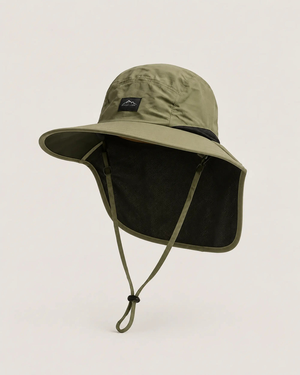 Green wide-brim sun hat with black mesh neck flap in front studio view