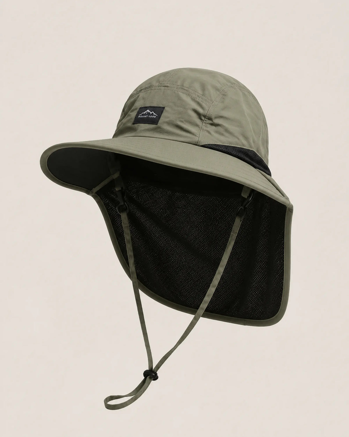 Green neck-flap sun hat shown from a left three-quarter studio angle