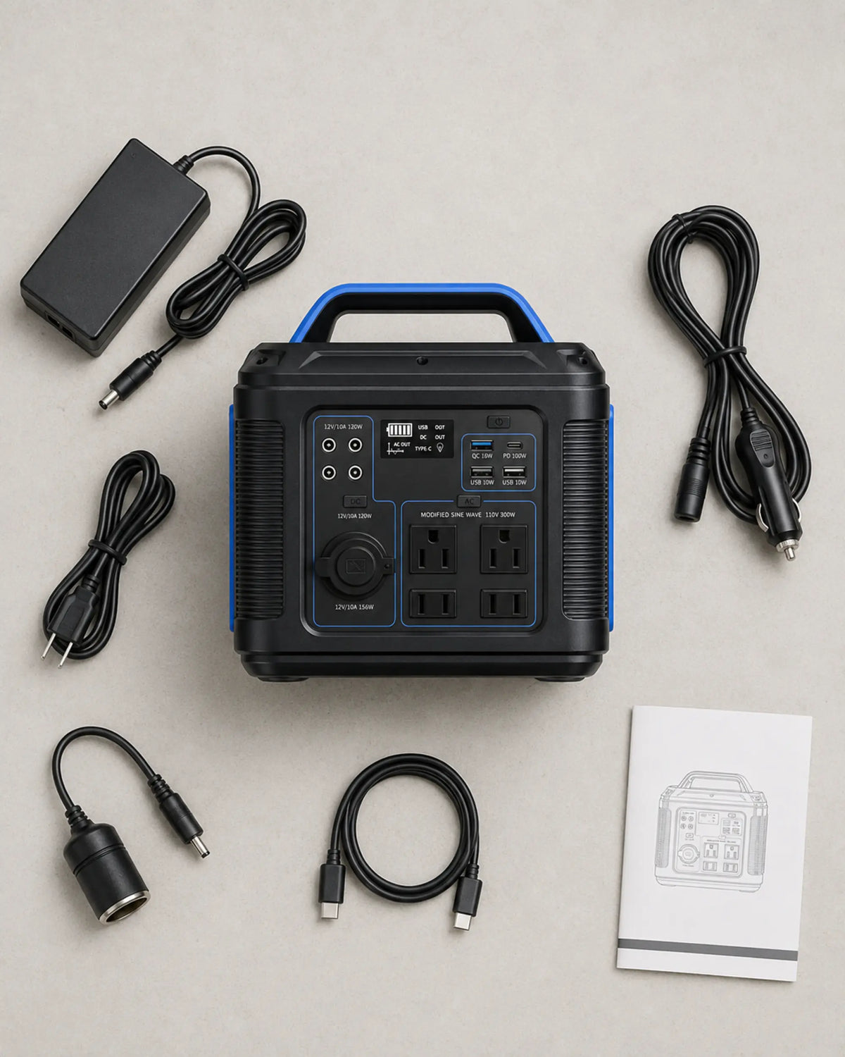 Blue P302 power station with adapter cables and manual in overhead flat lay
