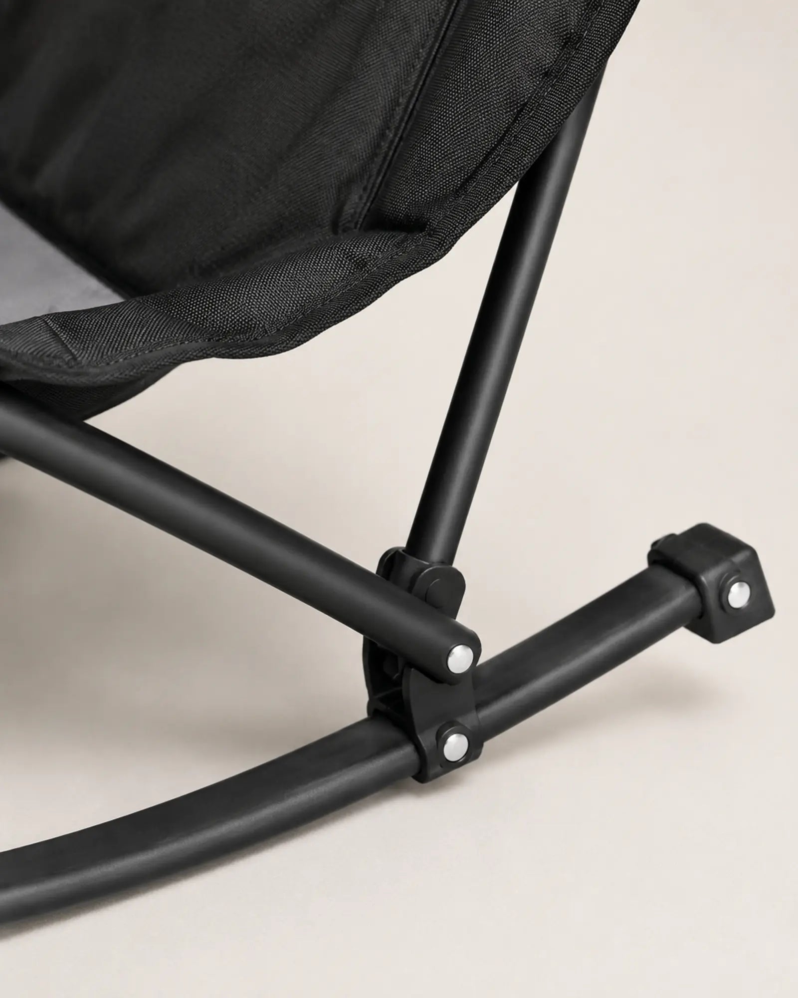 Close-up of the rocking rail joint and powder-coated frame