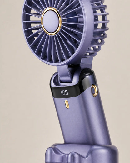 Close-up of Blue portable fan hinge, digital display, and gold control details