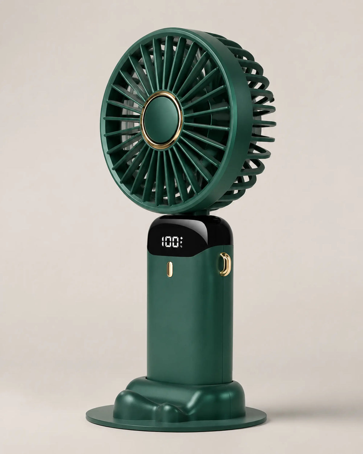 Green portable fan three-quarter view showing grille depth and gold details