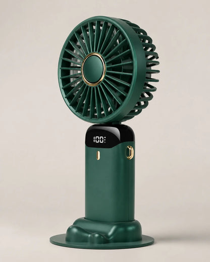 Green portable fan three-quarter view showing grille depth and gold details