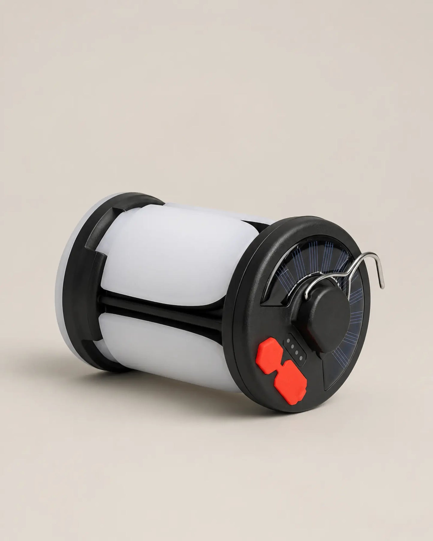 Compact four leaf solar camping lantern shown in side profile