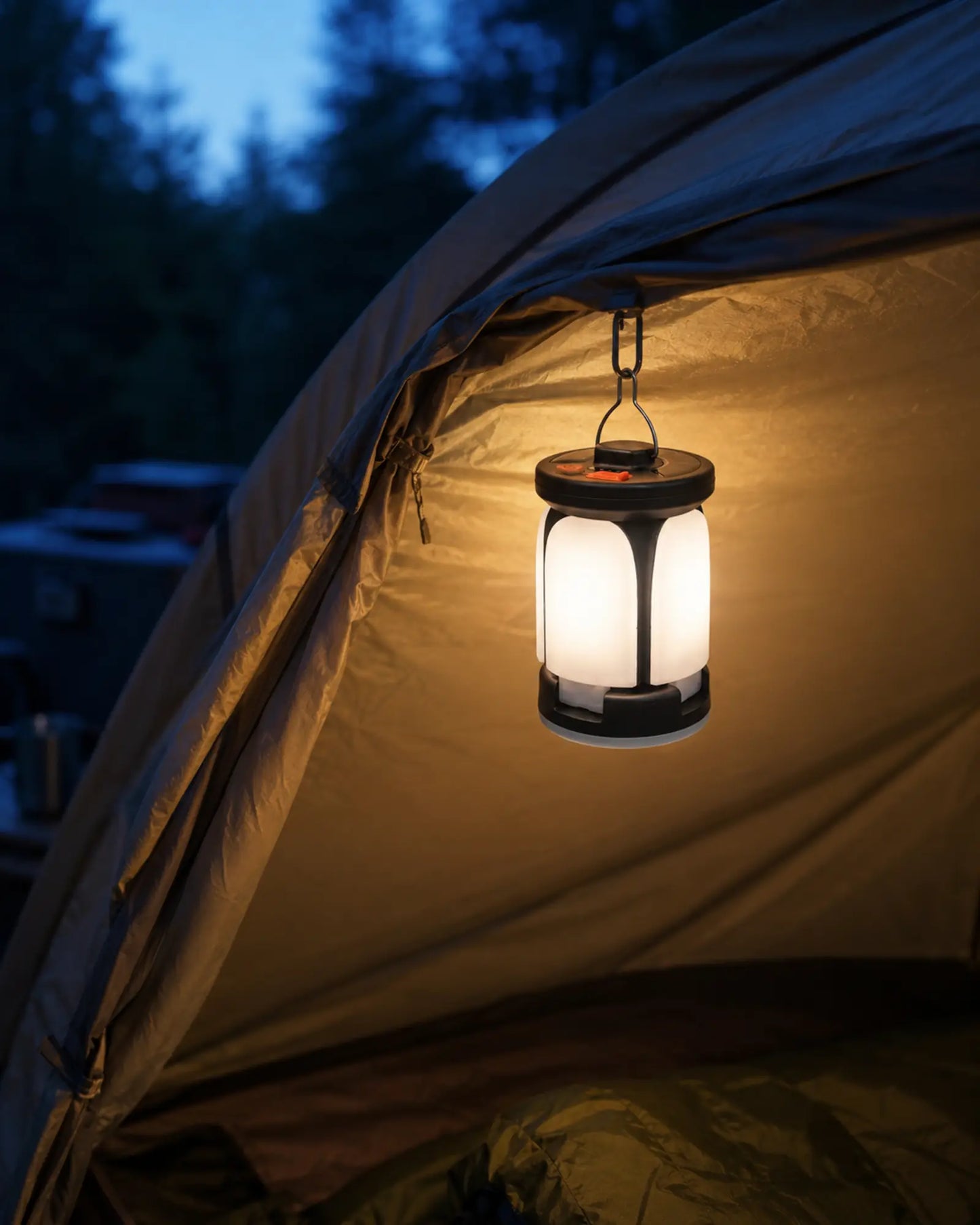 Four leaf rechargeable lantern hanging inside a forest campsite tent