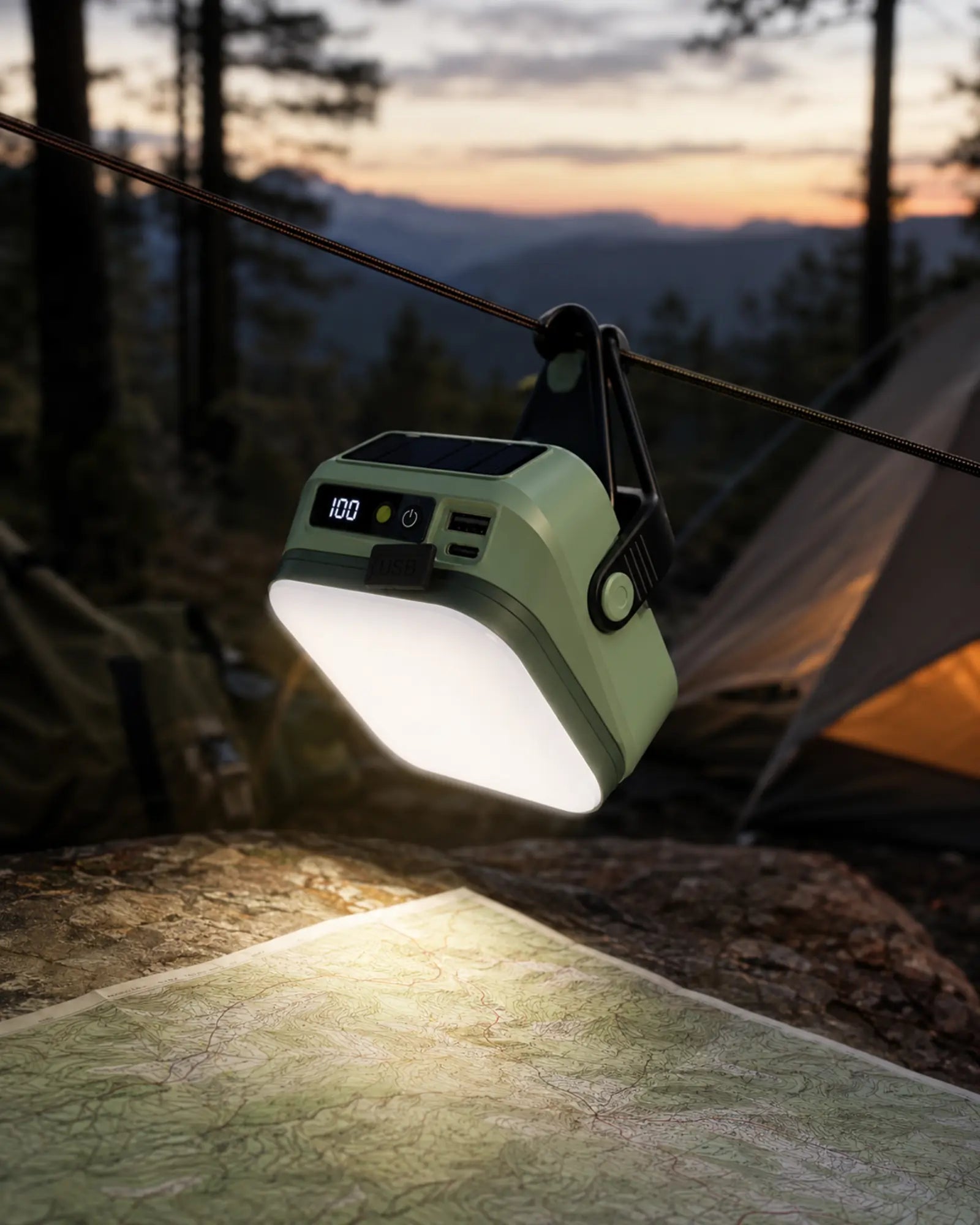 Style B rechargeable lantern lighting a trail map at dusk