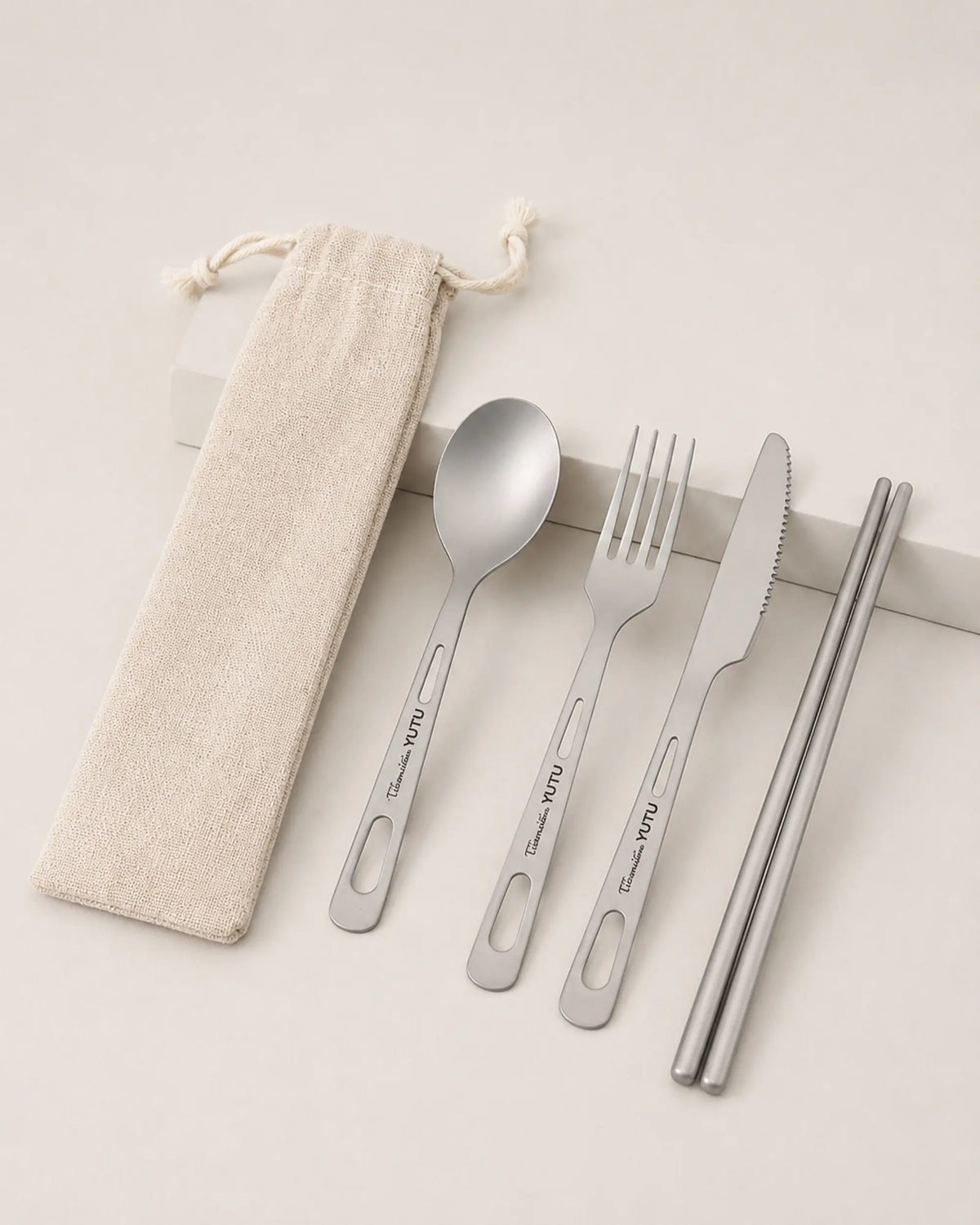 Three-quarter complete ARWE titanium cutlery set with chopsticks and pouch