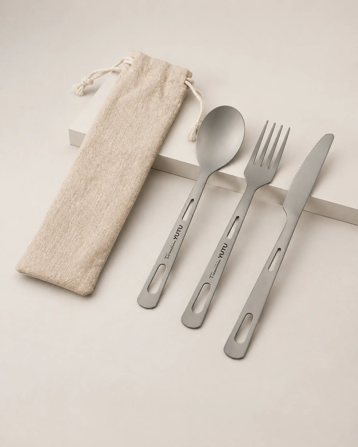 Three-quarter ARWE titanium spoon fork knife set with linen pouch