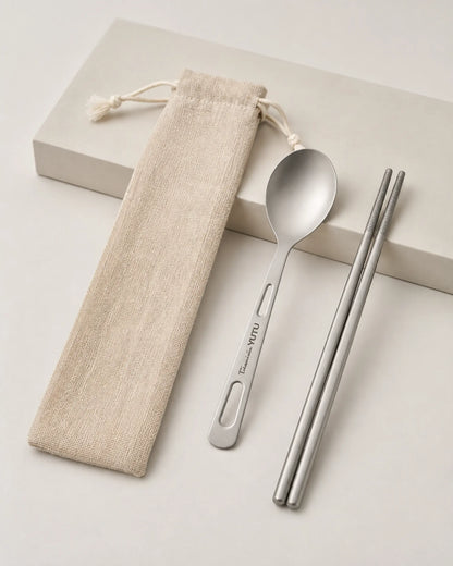 Three-quarter view of ARWE titanium spoon chopsticks and travel pouch