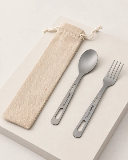 ARWE titanium spoon and fork set shown from left three-quarter angle