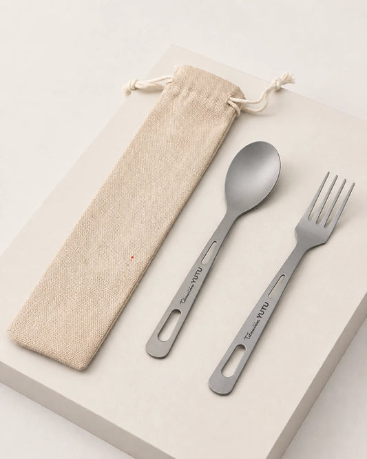 ARWE titanium spoon and fork set shown from left three-quarter angle