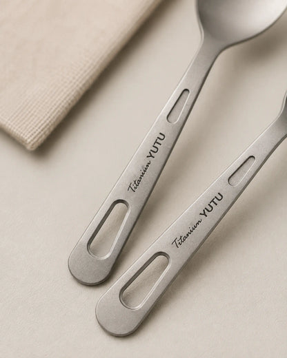 Macro detail of ARWE titanium cutlery handle cutouts and brushed finish