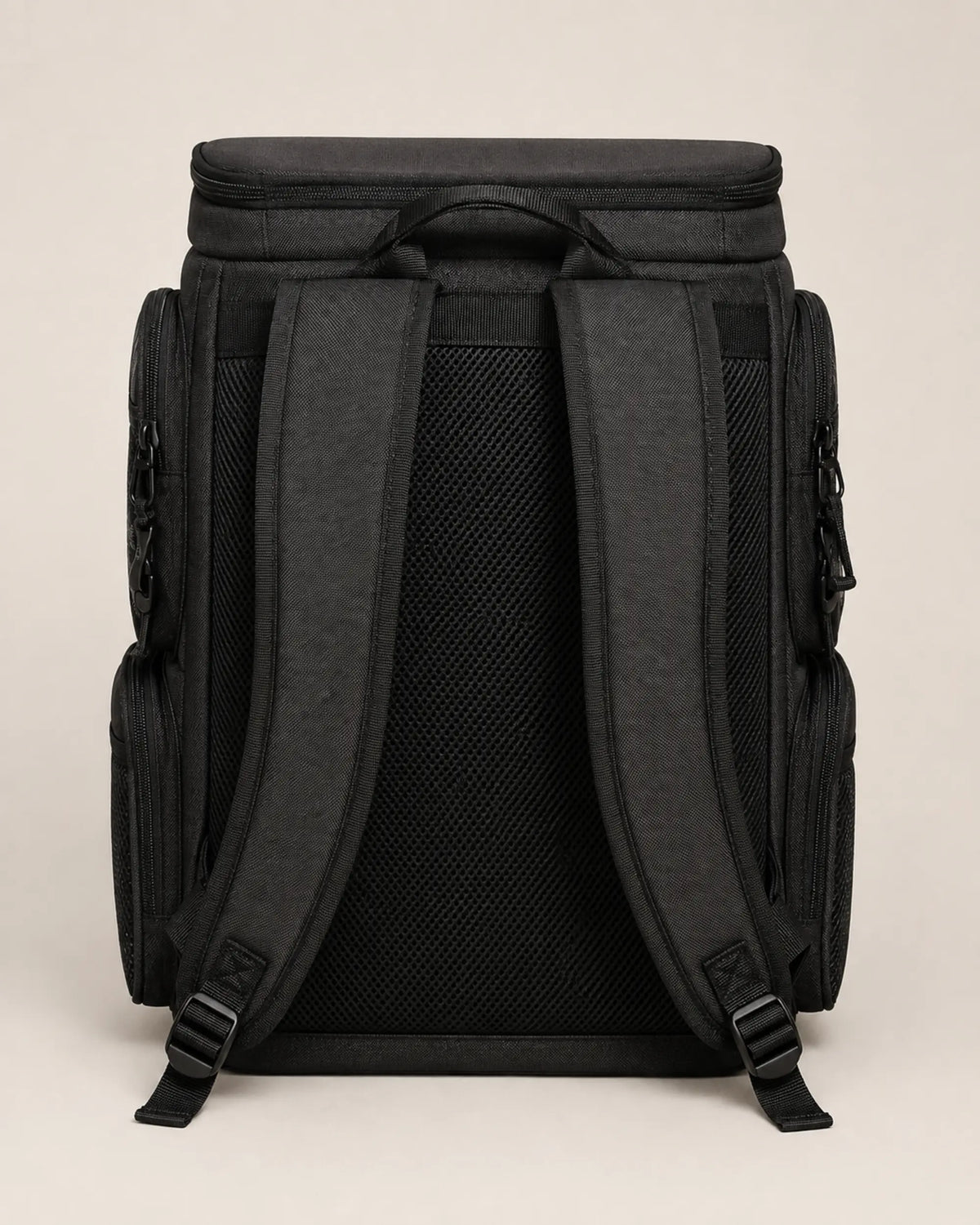 Rear view of black fishing tackle backpack with padded shoulder straps