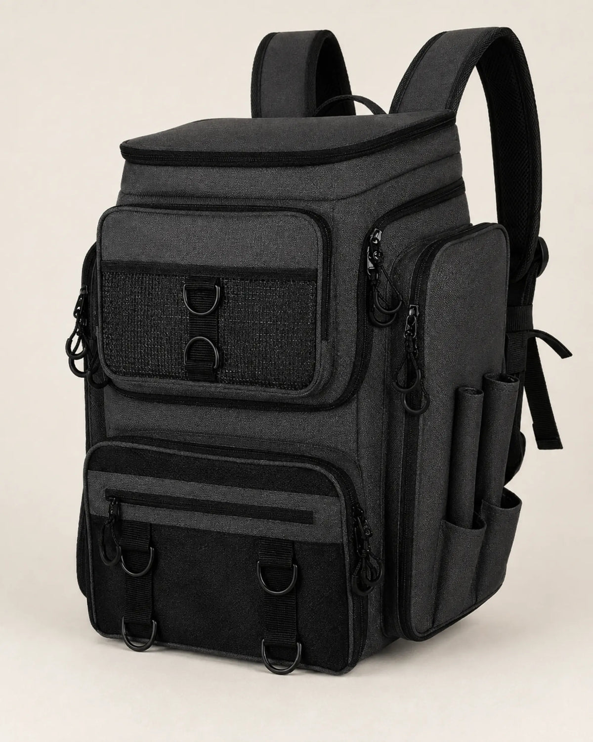 Black fishing tackle backpack viewed from the front left with mesh storage pockets