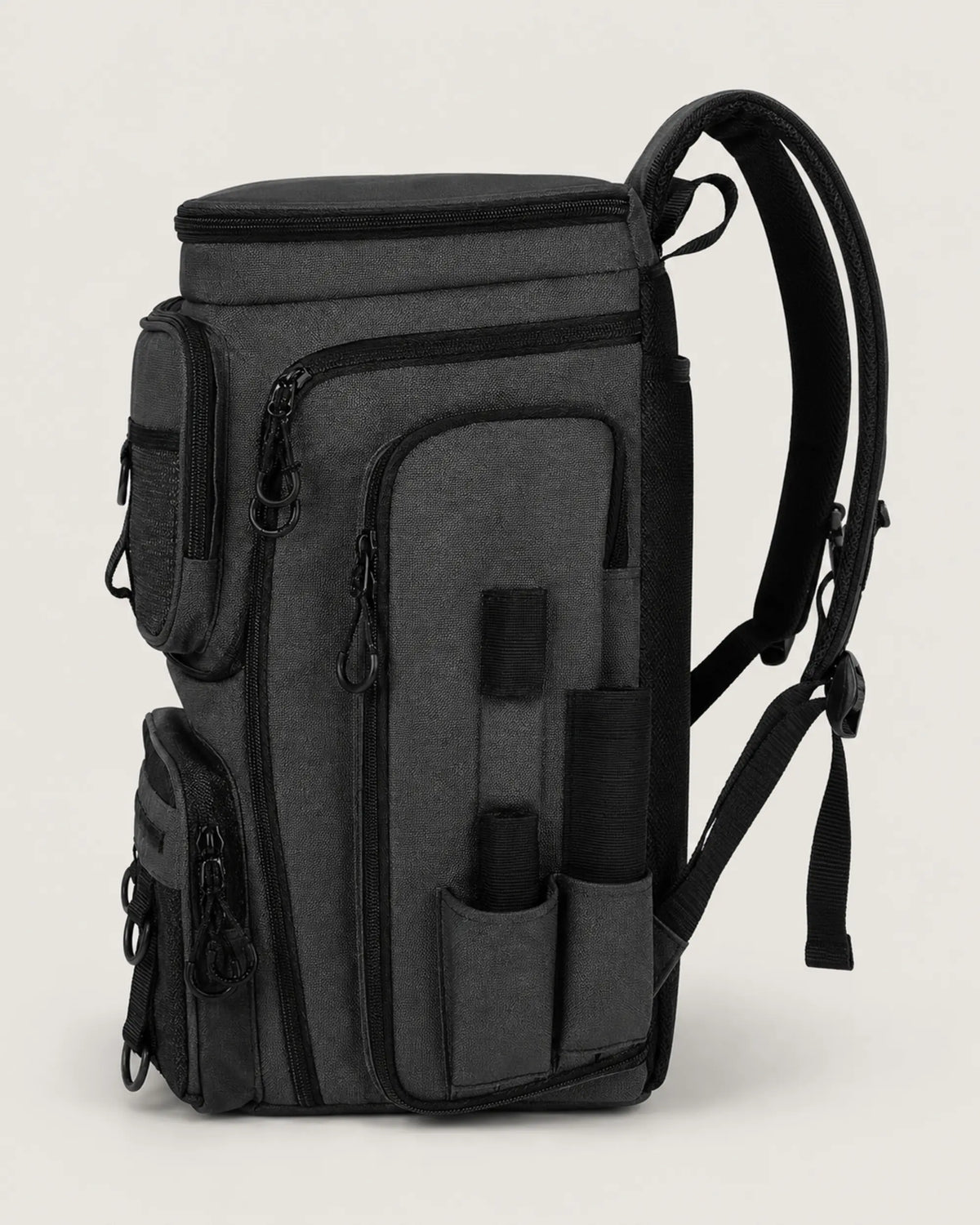 Black fishing tackle backpack side profile showing rod holder sleeves and zip pocket