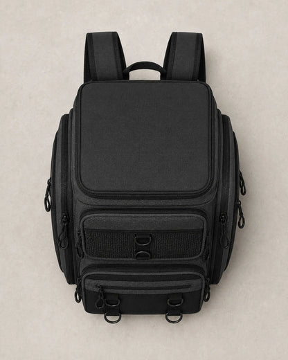 Top view of closed black fishing tackle backpack with zippered lid