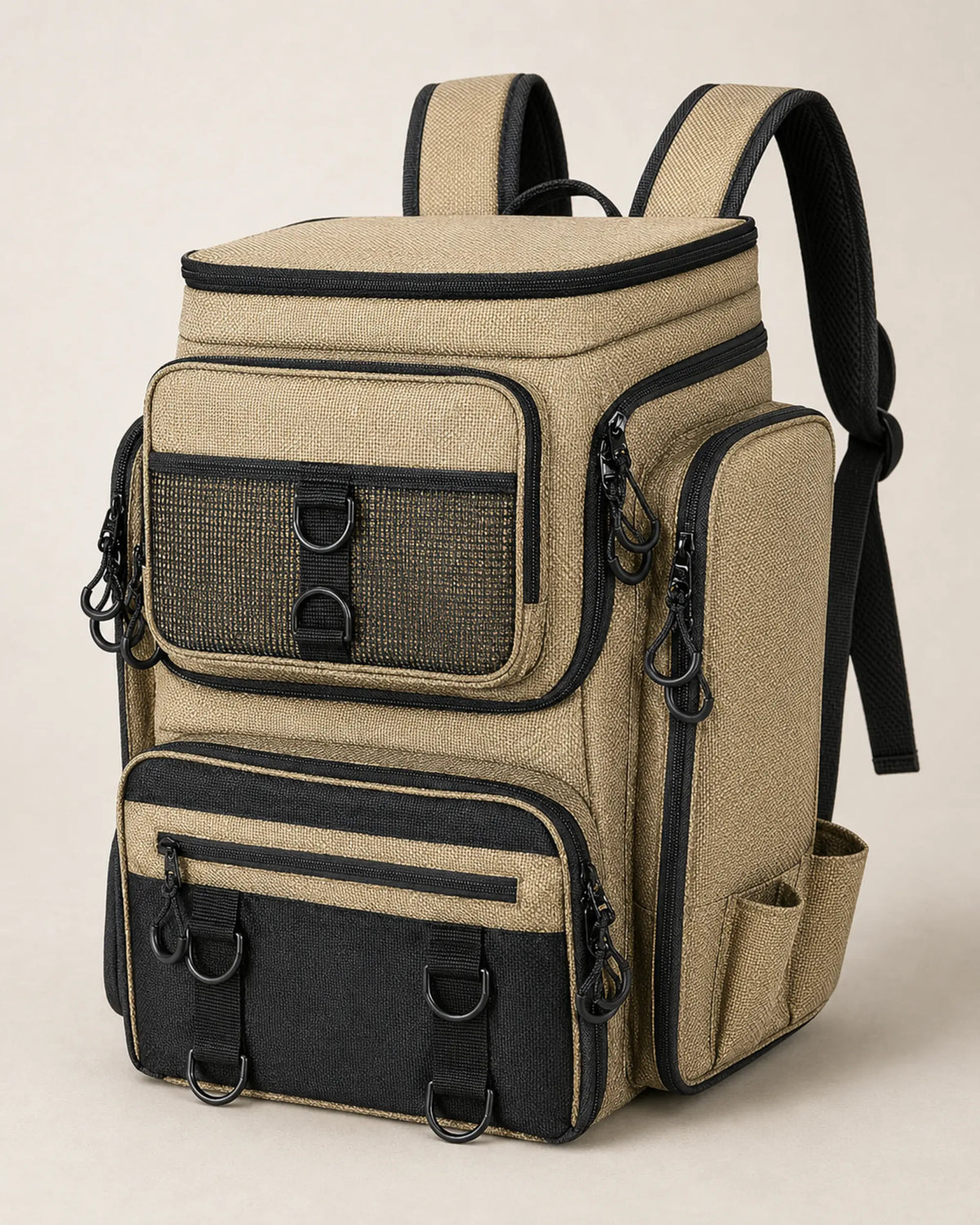 Khaki and black fishing tackle backpack in a front three-quarter studio view